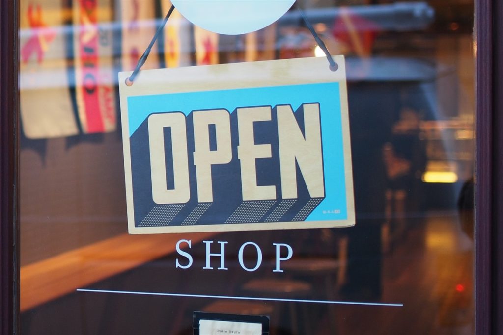 shop sign showing that they are open